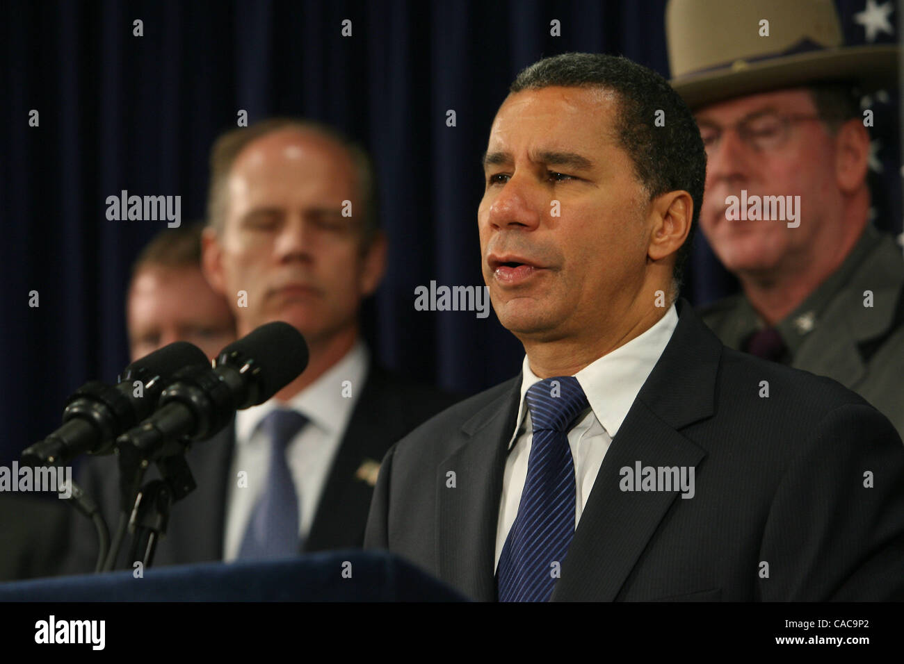 Governor David Paterson and DMV Commissioner David Swarts announcing results of the new facial