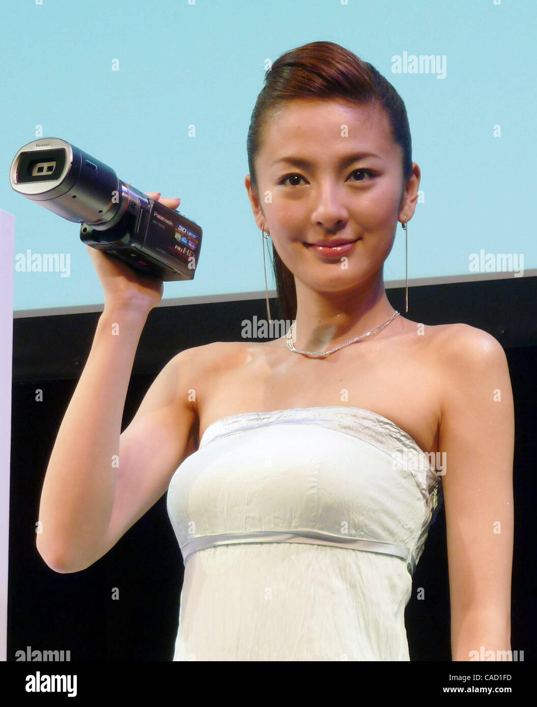 Jul 28, 2010 - Tokyo, Japan - Woman holds Panasonic's new HDC-SDT750