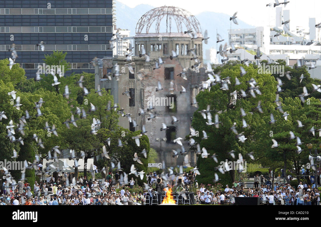 Aug 06, 2010 - Hiroshima, Japan -  Doves are released as a sign of peace during the Hiroshima Peace Memorial Ceremony in the Peace Memorial Park in Hiroshima, Japan. Japan marks the 65th anniversary of the world's first atomic bomb. (Credit Image: © Junko Kimura/Jana/ZUMApress.com) Stock Photo