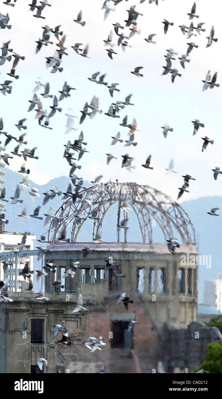 Aug 06, 2010 - Hiroshima, Japan -  Doves are released as a sign of peace during the Hiroshima Peace Memorial Ceremony in the Peace Memorial Park in Hiroshima, Japan. Japan marks the 65th anniversary of the world's first atomic bomb. (Credit Image: © Junko Kimura/Jana/ZUMApress.com) Stock Photo