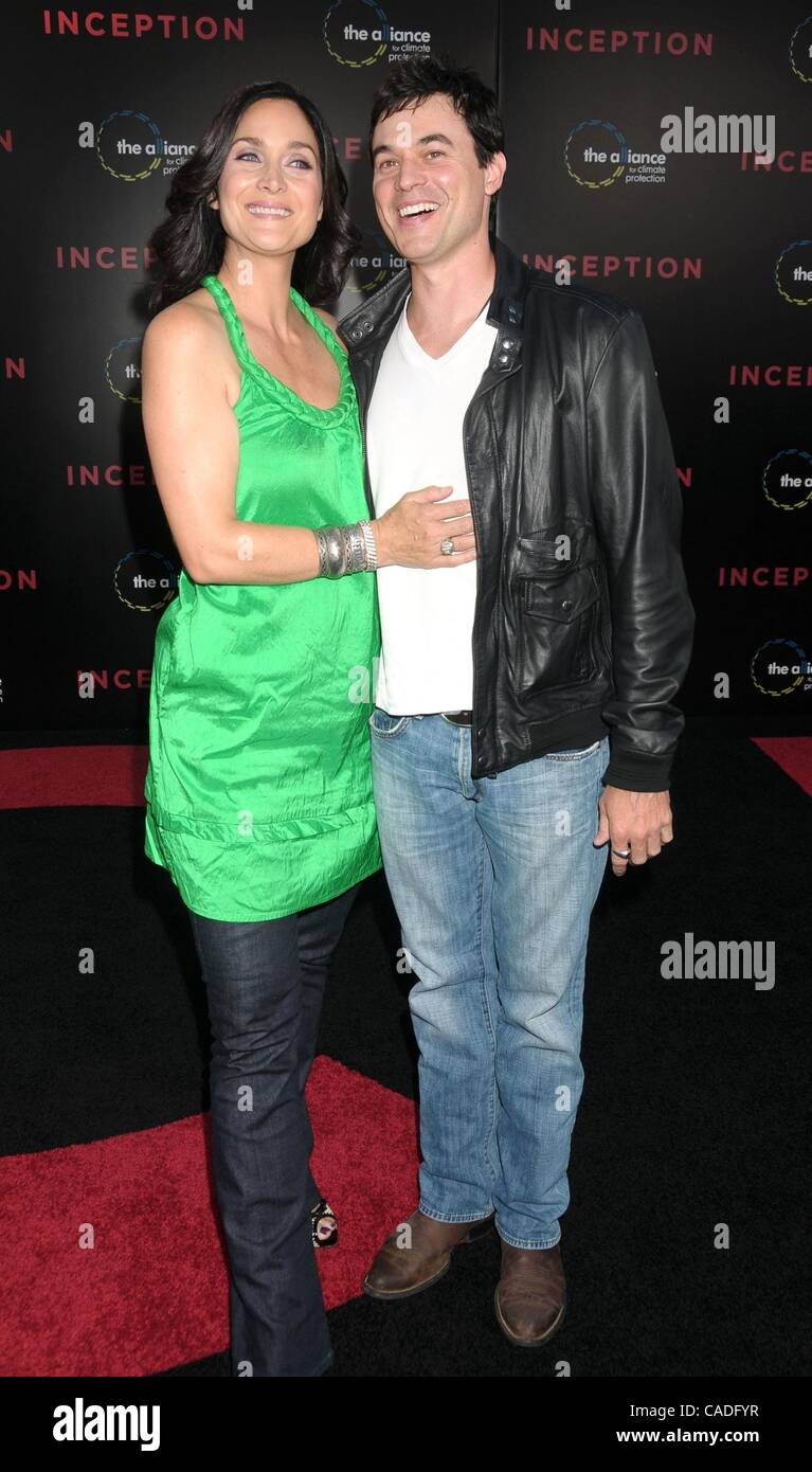 Jul 13, 2010 - Los Angeles, California, USA - Actress CARRIE ANNE MOSS and husband STEVEN ROY at the 'Inception' Los Angeles Premiere held at Grauman's Chinese Theater, Hollywood. (Credit Image: Â© Paul Fenton/ZUMA Press) Stock Photo