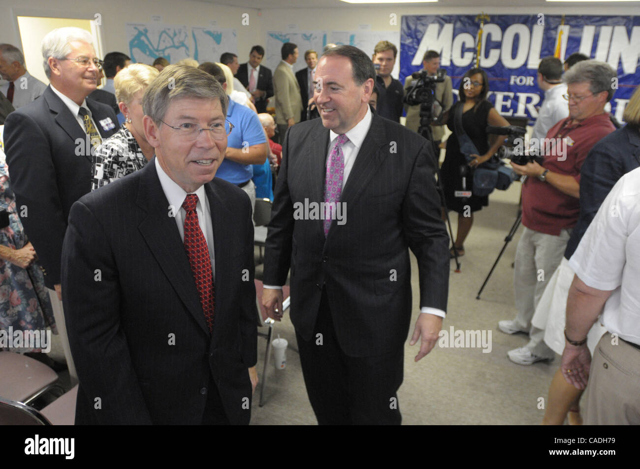 Aug 22, 2010 - Jacksonville, Florida, U.S. - Former Arkansas governor and presidential candidate MIKE HUCKABEE, center, helps Republican candidate for Florida governor BILL McCOLLUM, left, stump for votes at a campaign stop in Jacksonville, Florida, August 22, 2010.  (Credit Image: © Phelan Ebenhack Stock Photo