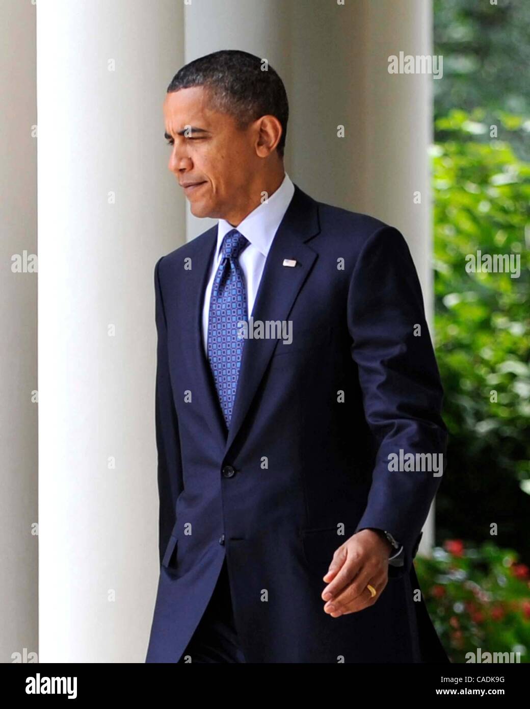 July 27, 2010 - Washington, District of Columbia, U.S. - President Barack Obama  emerges from the Oval Office to make a statement after meeting with House Speaker Nancy Pelosi . The President  urged members of Congress to not let partisan politics overwhelm the political process as election season a Stock Photo