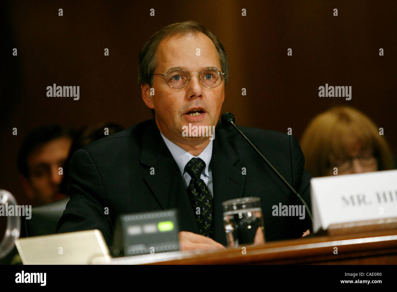 July 21, 2010 - Washington, D.C, U.S. - Washington, D.C. - July 21st:  Managing director of the Financial Markets and Community Investment Team at Government Accountability Office RICHARD HILLMAN testifies before the Senate Finance Committee to give an update about the status of the Troubled Asset R Stock Photo