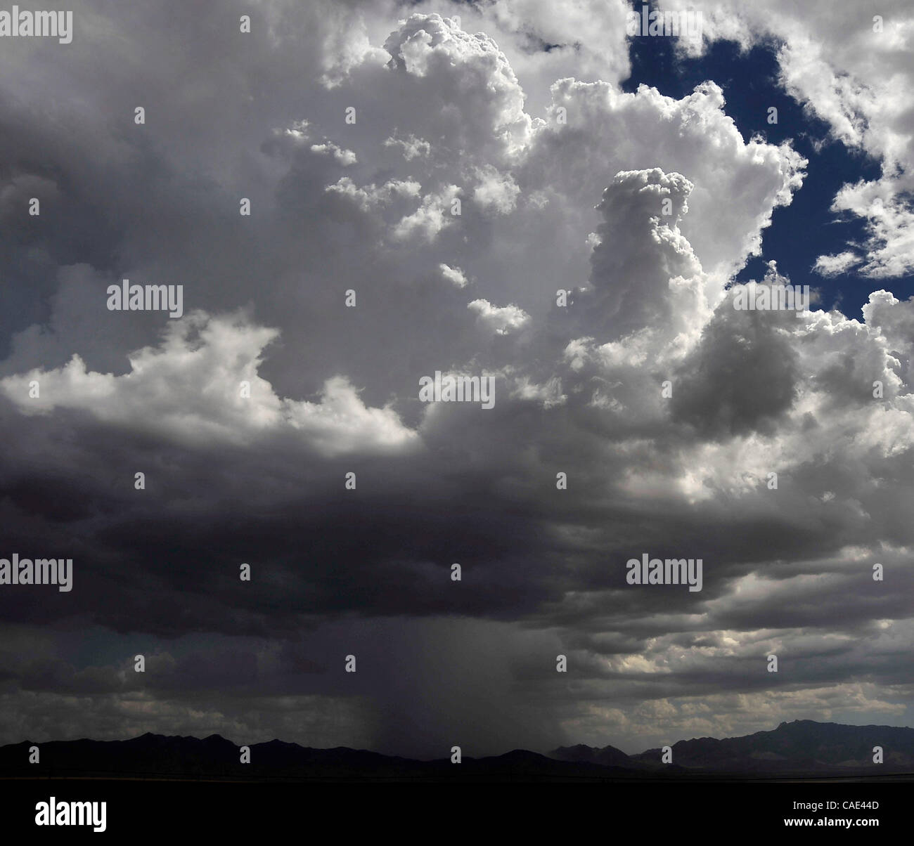 Aug 1718 Searchlight, Nevada, USA. Monsoon clouds cross over the town