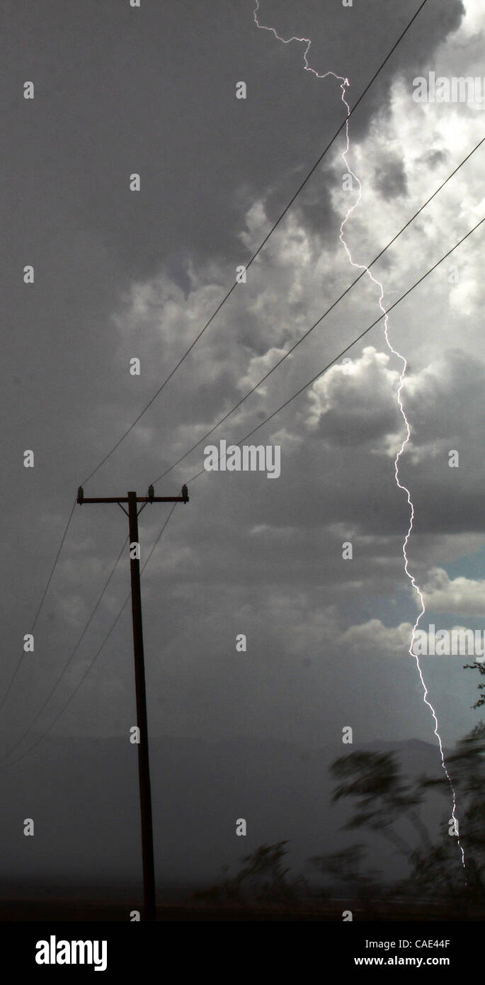 Aug 1718 Searchlight, Nevada, USA. Monsoon clouds cross over the town