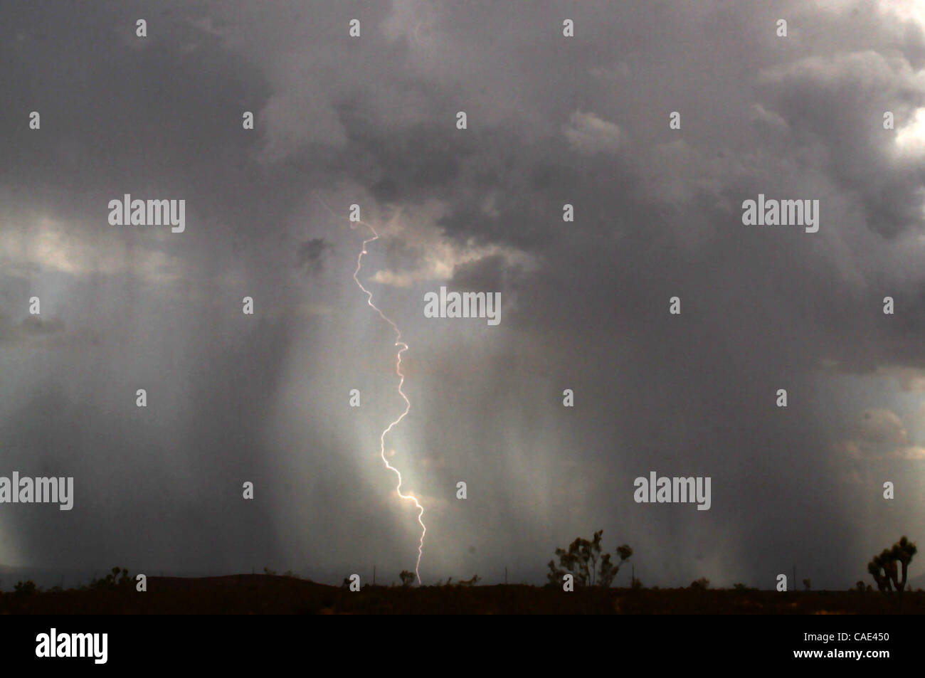 Aug 1718 Searchlight, Nevada, USA. Monsoon clouds cross over the town