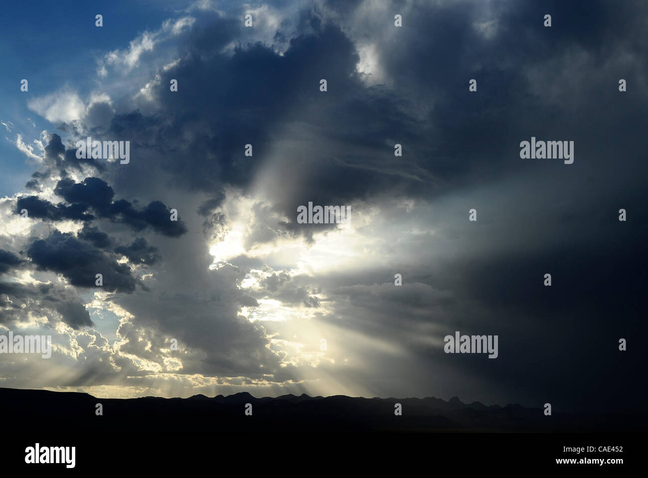 Aug 1718 Searchlight, Nevada, USA. Monsoon clouds cross over the town