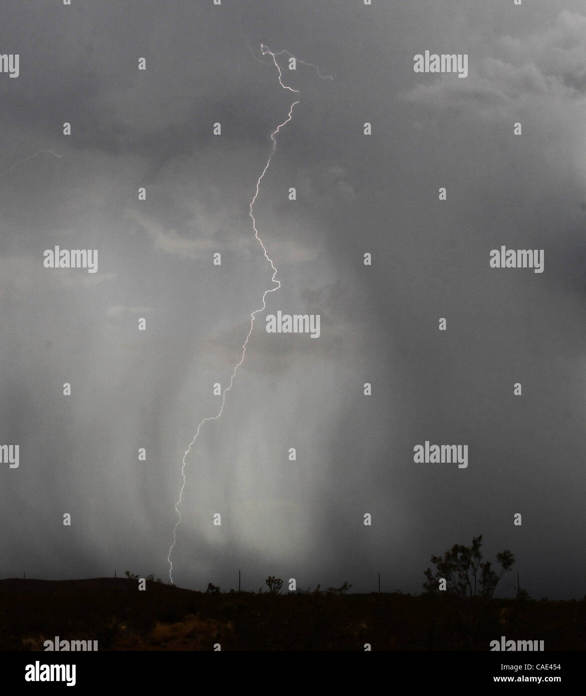 Aug 1718 Searchlight, Nevada, USA. Monsoon clouds cross over the town