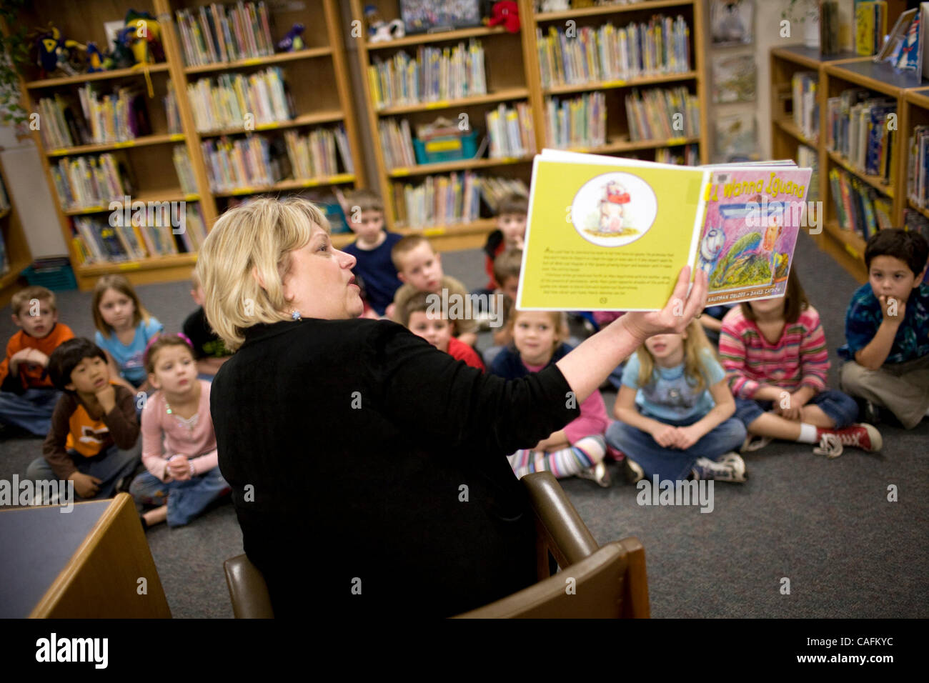 Trudy Erickson (cq), principal of Del Dayo Elementary School, reads the