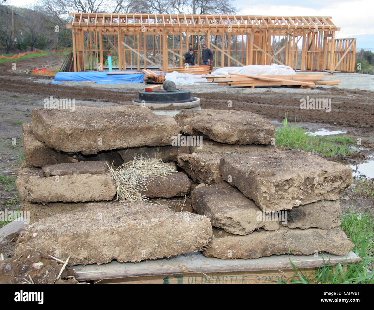 Adobe blocks melt down as a reproduction of an old bunk house goes up at the Alviso Adobe Community Park in Pleasanton, Calif. , onWednesday, February 20, 2008..(Jay Solmonson/Tri-Valley Herald) Stock Photo