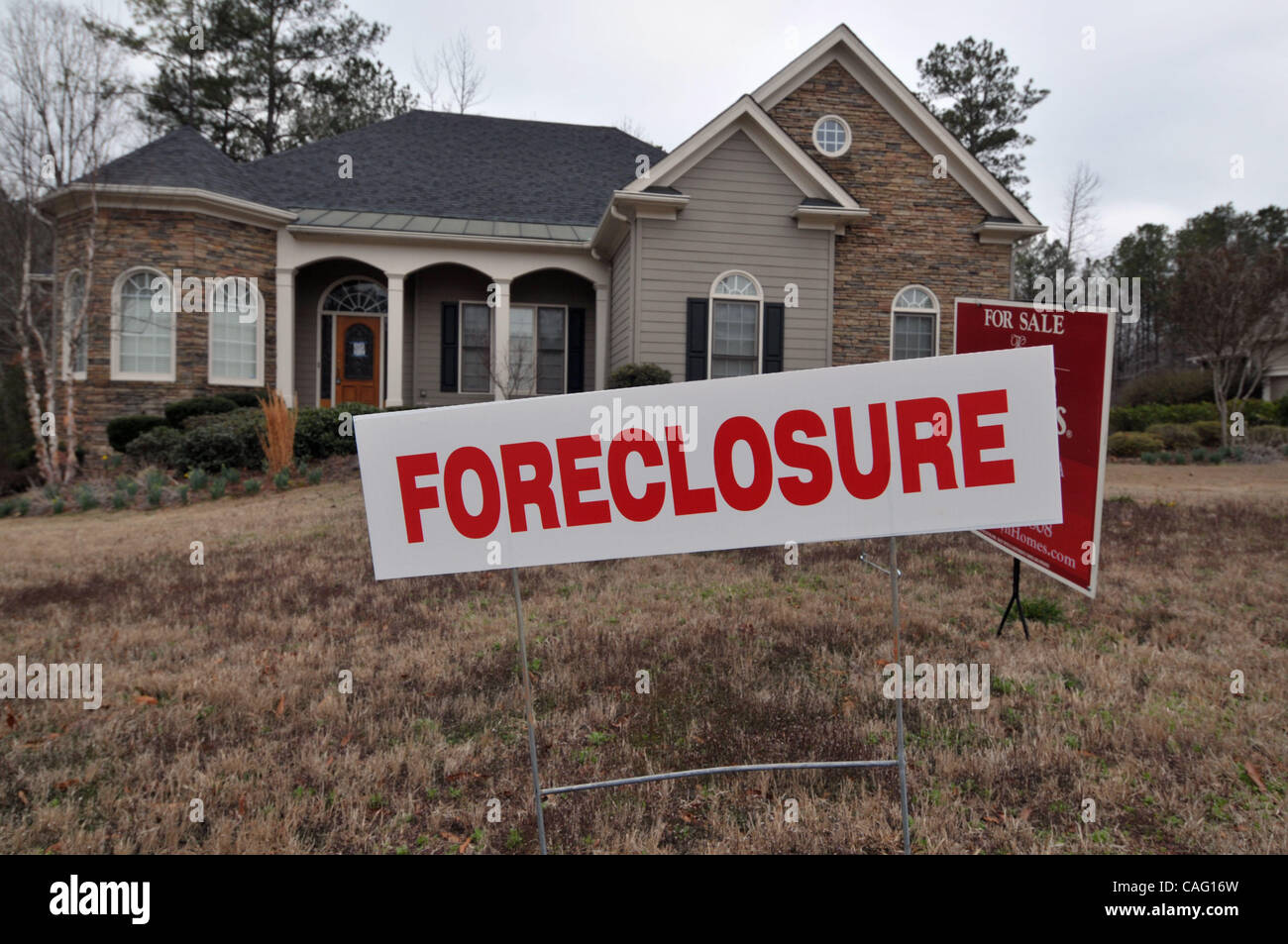 Feb 24, 2008 - Canton, Georgia, USA - Foreclosed, bank-owned home in expensive suburb north of Atlanta. 'The tip of the iceberg gets larger every week' says one Atlanta area real estate investor of the growing numbers of foreclosed homes on the market. The numbers are expected to surge dramatically  Stock Photo