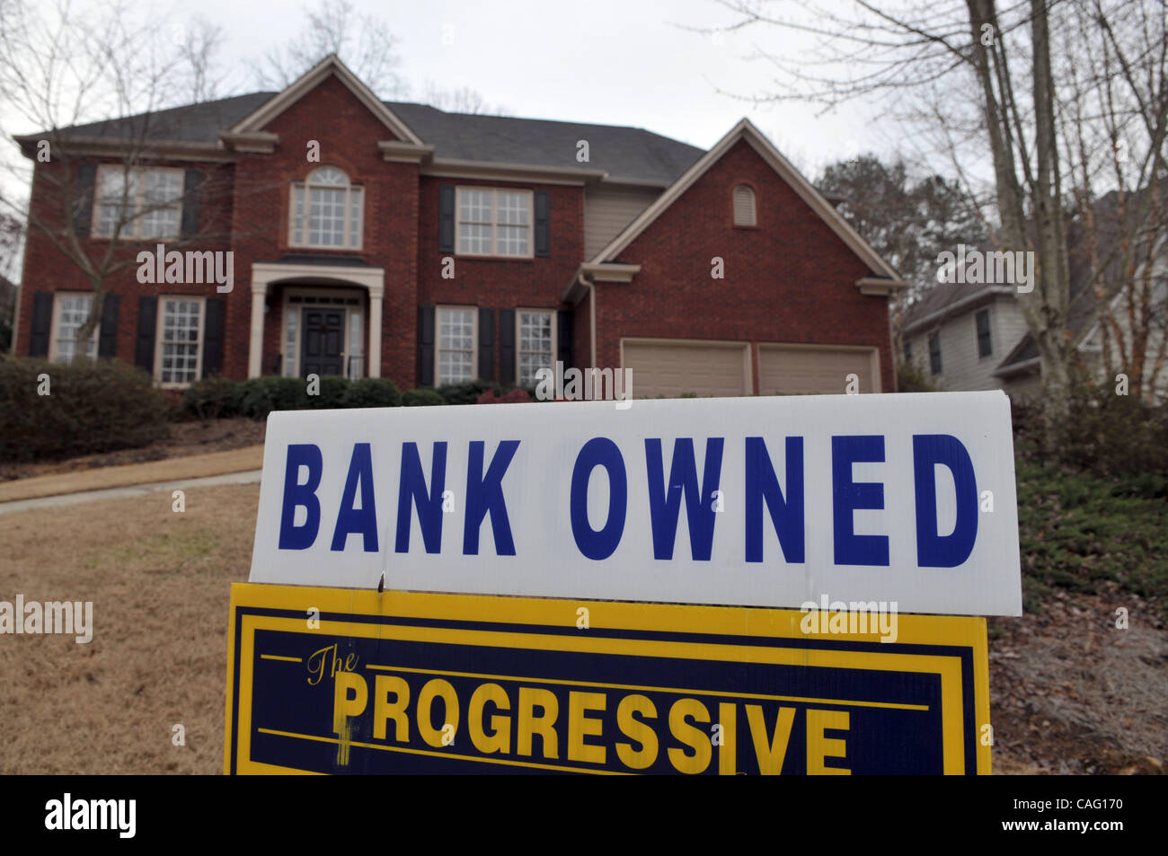 Feb 24, 2008 - Canton, Georgia, USA - Foreclosed, bank-owned home in expensive suburb north of Atlanta. 'The tip of the iceberg gets larger every week' says one Atlanta area real estate investor of the growing numbers of foreclosed homes on the market. The numbers are expected to surge dramatically  Stock Photo
