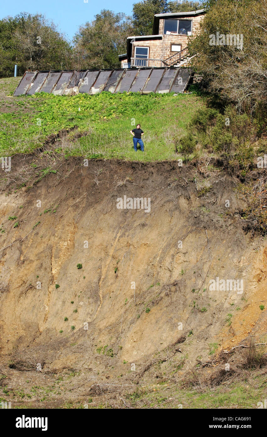 Carolyn Worthington stands atop a sliding hillside just below her La ...