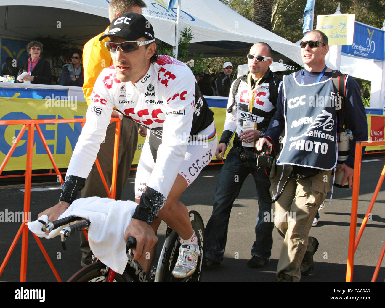 Fabian Cancellara rides to the podium after winning the Tour of ...