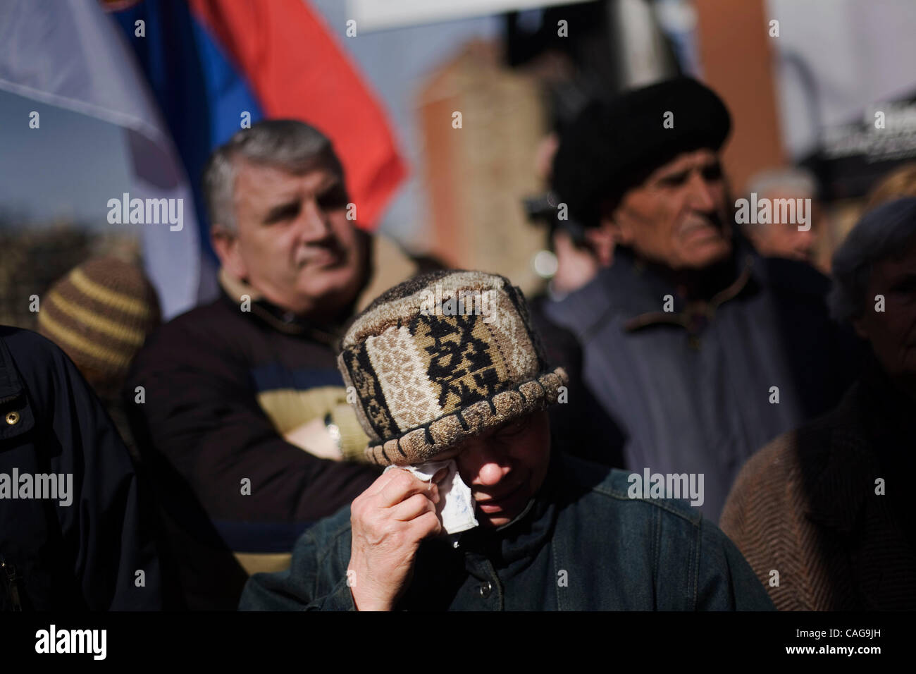 Feb 18, 2008 - Mitrovica, Kosovo - A Serbian woman cries at Serbians' protest against the independence of Kosovo and international recognition of the new nation in the north side of Mitrovica. The Kosovo Serbs set off sporadic explosions and torched a checkpoint between Serbia and Kosovo to symboliz Stock Photo