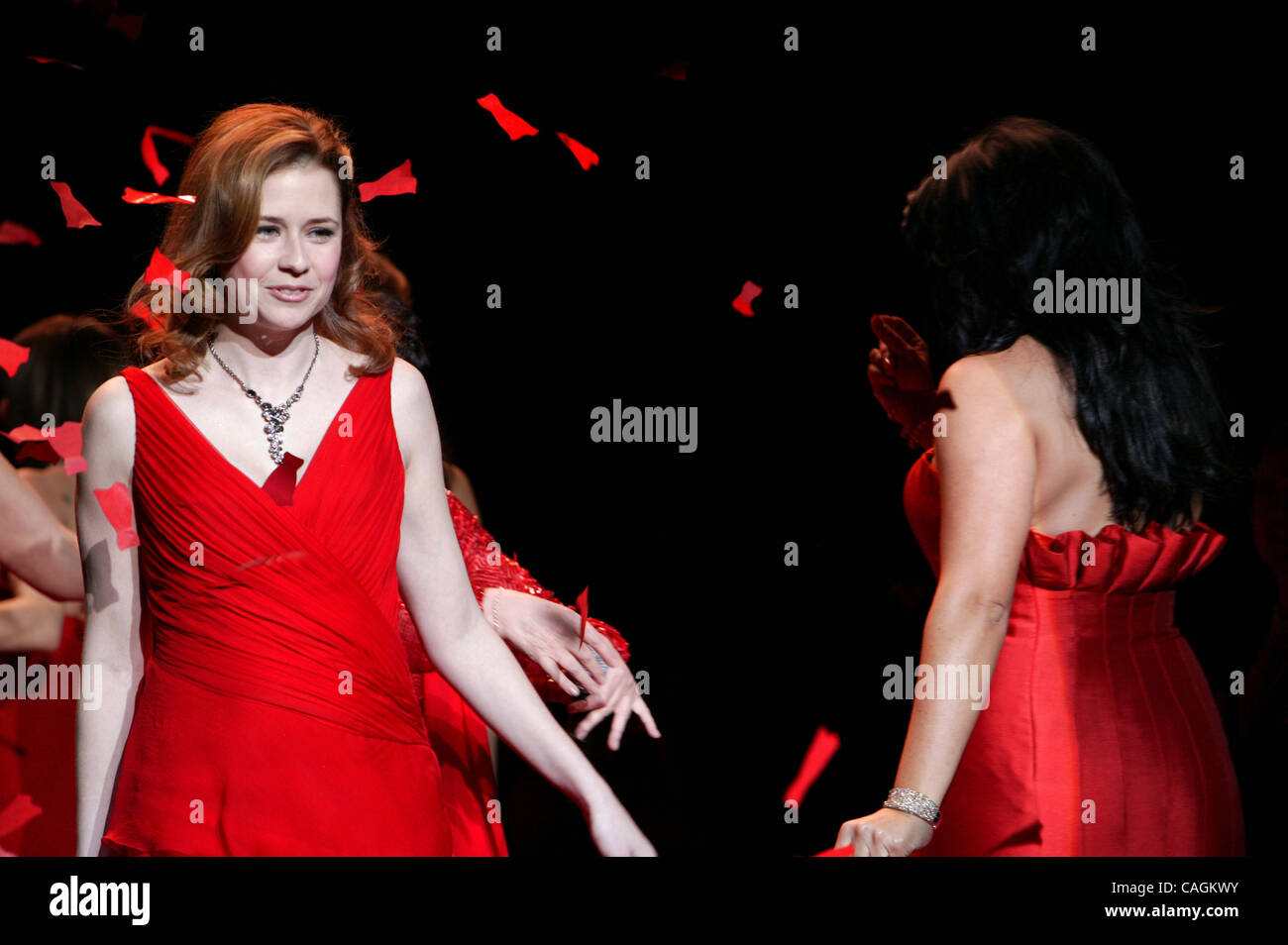 jenna fischer red dress Jenna Fischer walks down runway at The Heat's Truth Red Dress Collection at  Mercedes-Benz Fashion Week Fall 2008. Fischer received an Emmy nomination  for her work in NBC's hit show The Office