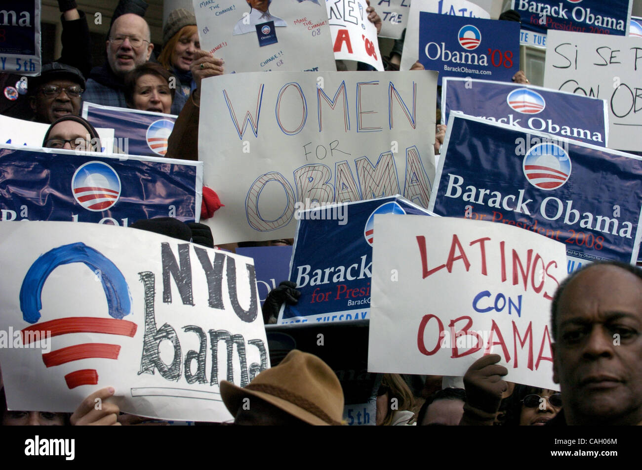 People hold up signs at a rally on City Hall Steps as New York elected ...