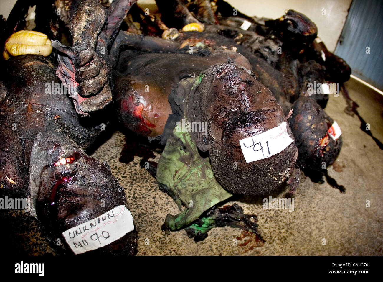 1.Provincial Municipal Mortuary, Nakuru Bodies littered the floor highlighting the mortuary was at full capacity. Most of the victims either died of gunshot wounds, burnt to death or poison arrows. 55 were admitted in 48 hours with many more expected. At the city mortuary bodies were piled in three Stock Photo