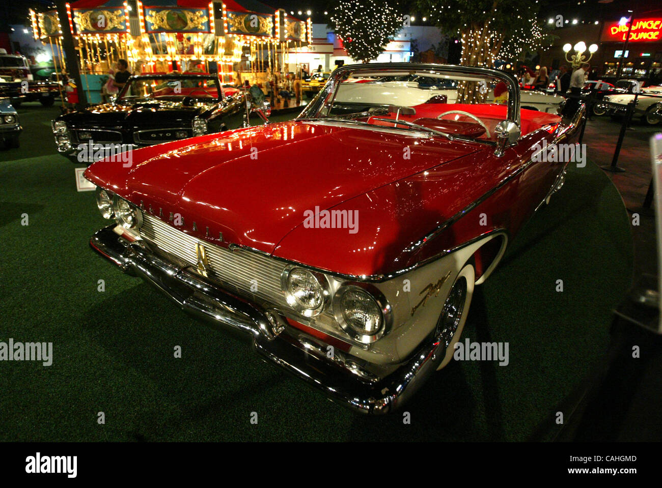 011808 met staluppi 1--Staff Photo by Uma Sanghvi/The Palm Beach Post-0047803A--For story by Jose Lambiet--North Palm Beach--Shown here is a 1960 Plymouth Fury (318 Cu. In.), from the private car museum of John Staluppi, photographed at a gala Friday night. NOT FOR DISTRIBUTION OUTSIDE COX PAPERS. O Stock Photo