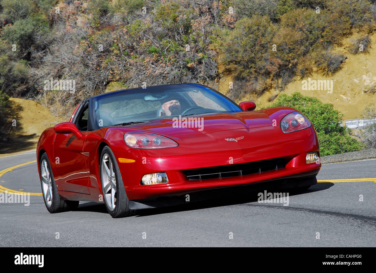 Dec 12, 2007 - Los Angeles, California, USA - There are many upgrades and refinements in this latest C6 Corvette, making it a true super car with a quicker 0-60mph time of just 4.1sec., and a top speed of 190mph. These facts are due to the new LS3 6.2 liter, V8 engine that now pumps out 430hp at 5,9 Stock Photo
