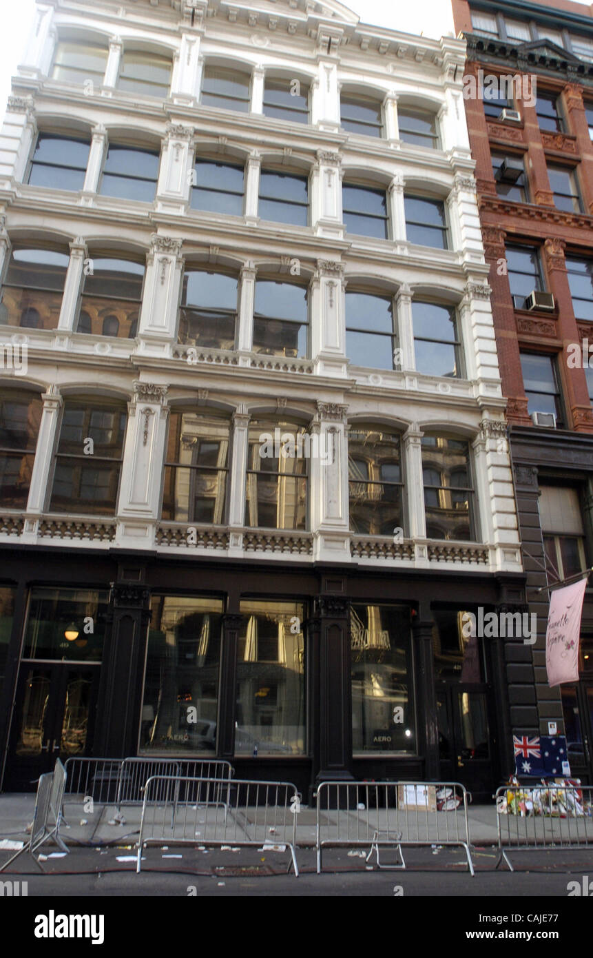 People gather at a makeshift shrine to Heath Ledger outside the SoHo