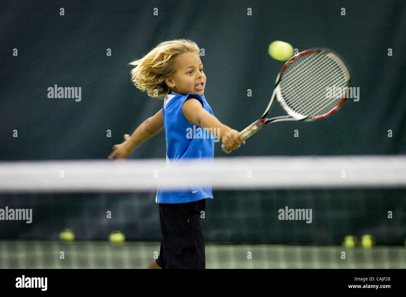 LEDE Six-year-old Jan Silva practices tennis with his family at Spare Time  Indoor Tennis Center in Gold River December 20, 2007. The youngster has  amazing tennis skills for his age, which has