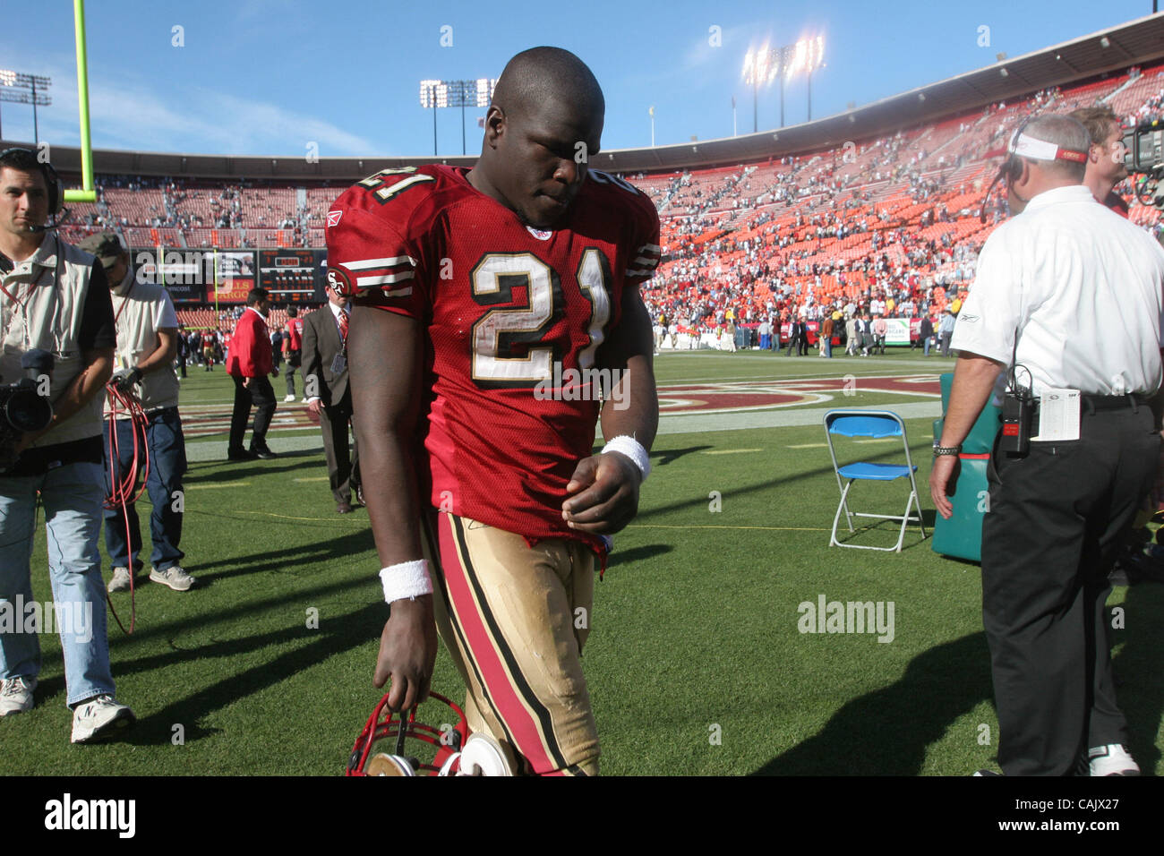 Forty-Niner running back Frank Gore walks off the field after a 23-3 ...