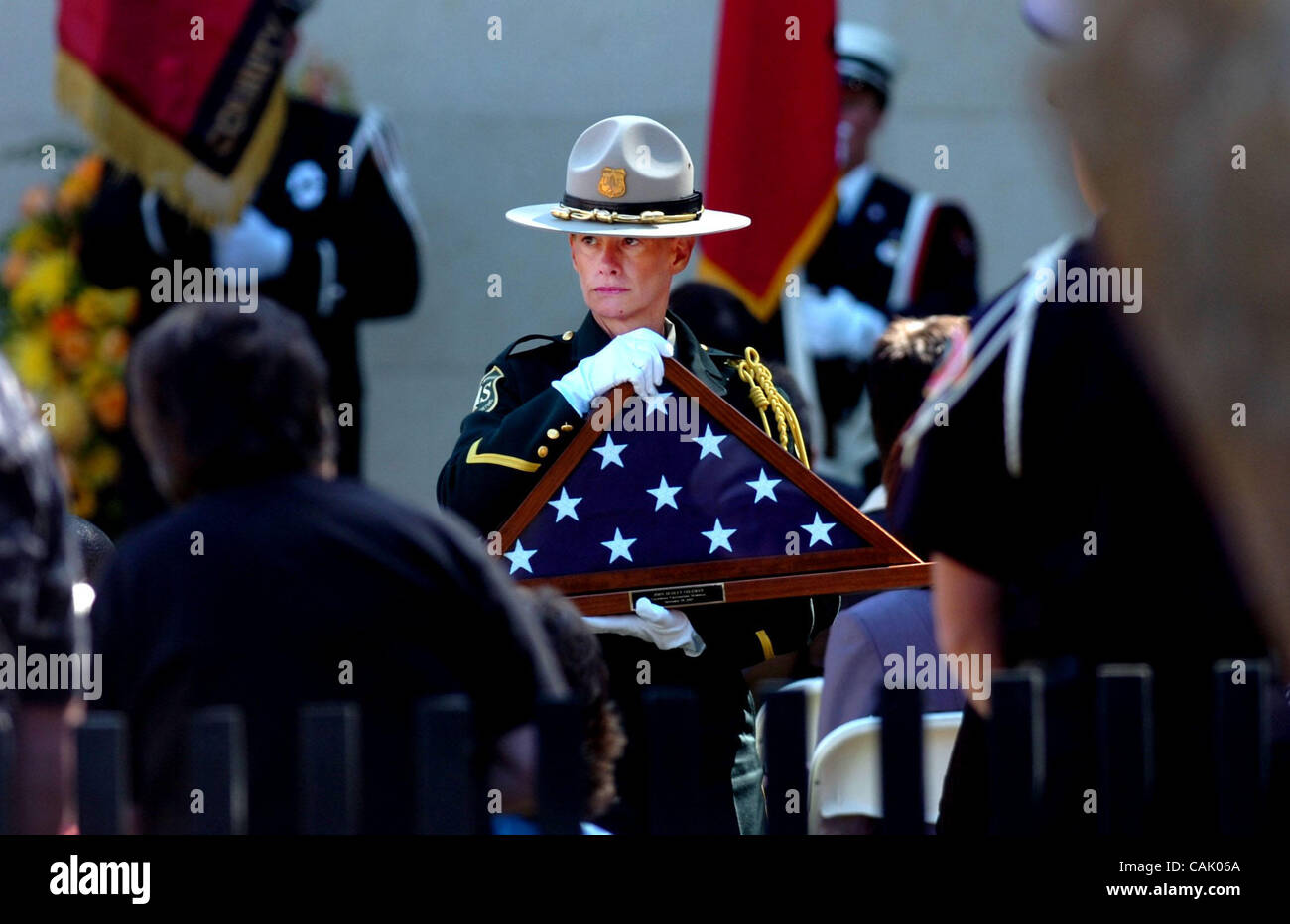 Usfs Officer An unidentified US Forest Service officer, presents a flag to the ...