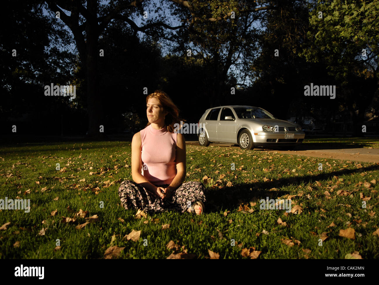 Stephanie Parmely bought a VW Golf TDI because it runs on biodesil fuel which is more earth-friendly.  She loves her car.  Portrait photographed near Land Park in Sacramento  October 4, 2007.  Sacramento Bee/ Autumn Cruz Stock Photo