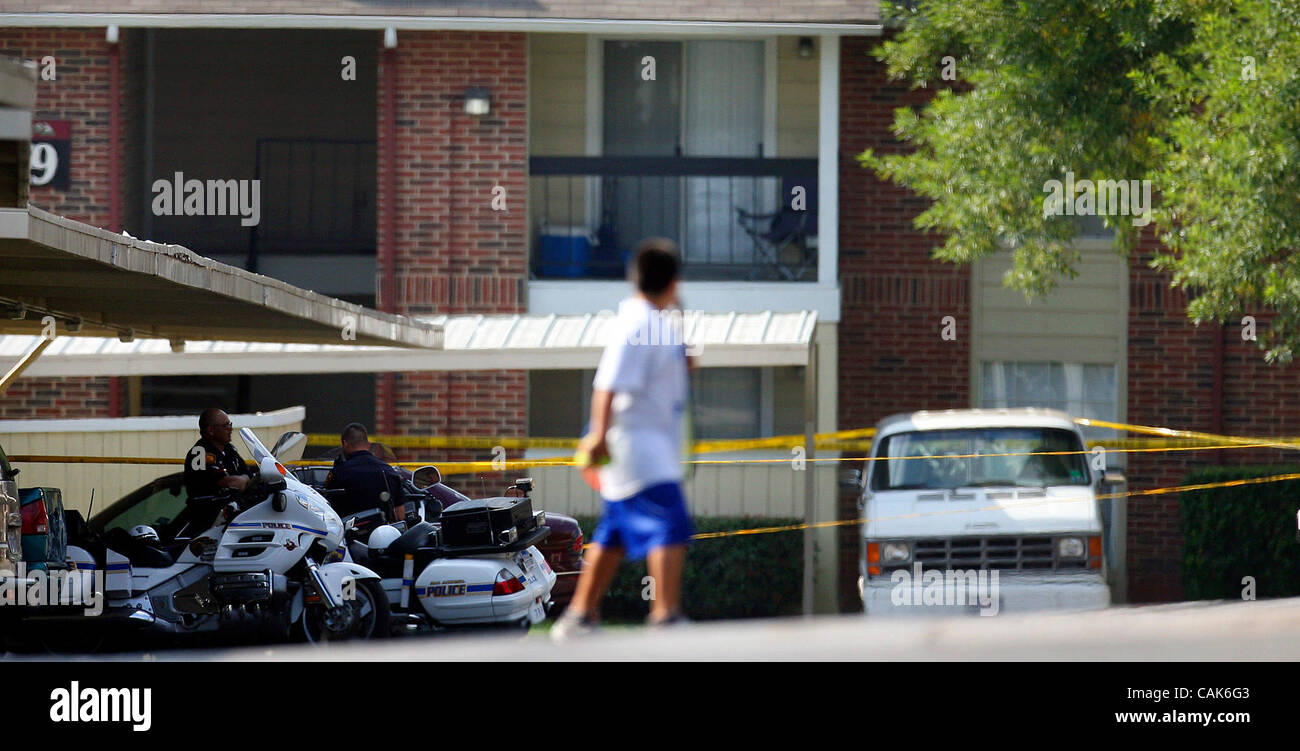 FOR METRO - A resident of The Villas of St. Moritz Apartment Homes looks at the crime scene where a SAPD officer was shot and later died Friday Sept. 21 2007. (PHOTO BY EDWARD A. ORNELAS) Stock Photo