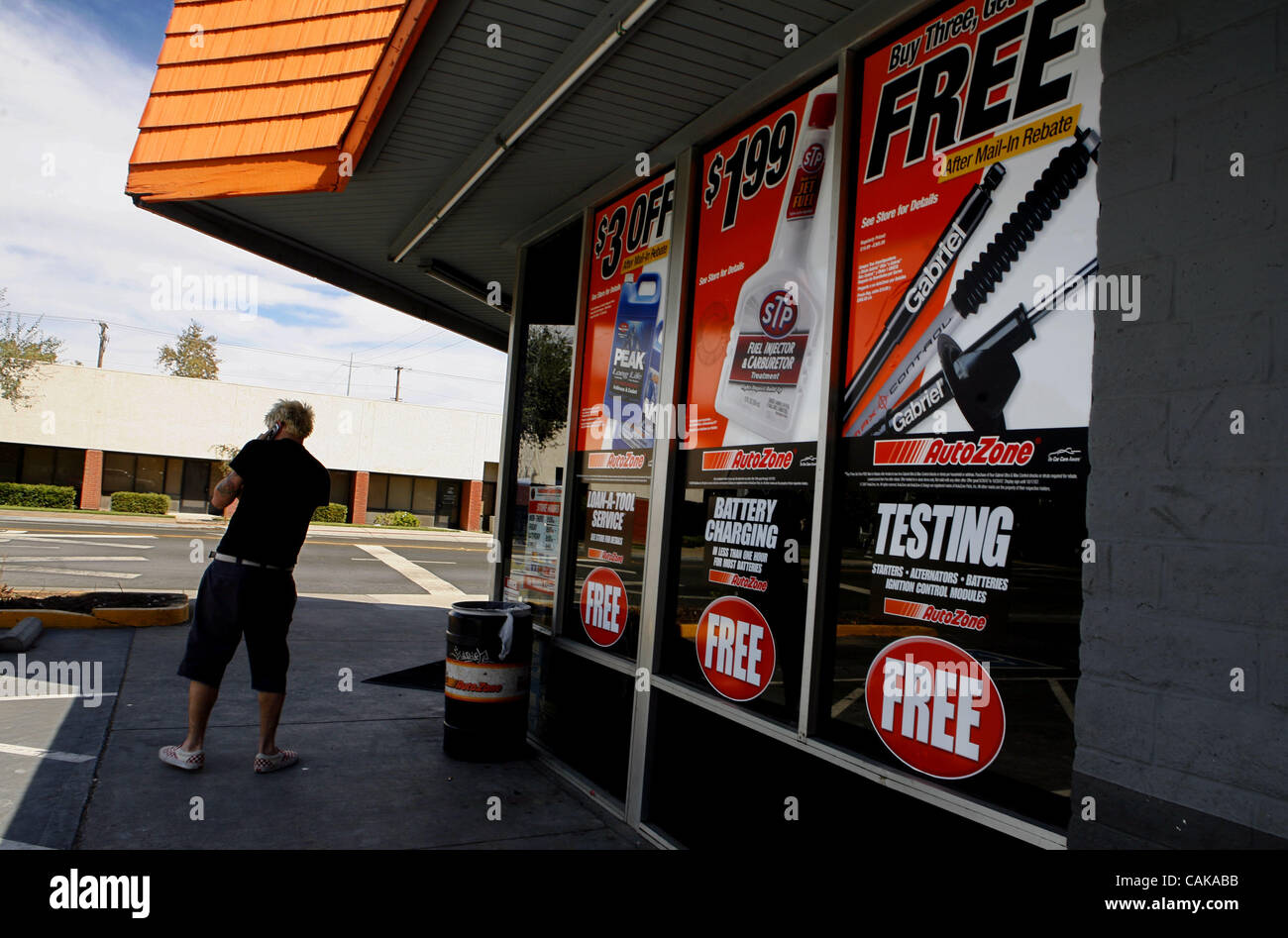 Ads Line The Window Of Autozone On Broadway In Sacramento Offer