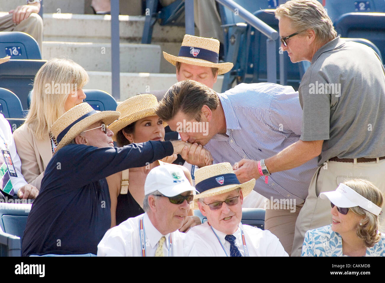 Alec Baldwin kisses Kirk Douglas hand as Catherine Zeta Jones & Michael