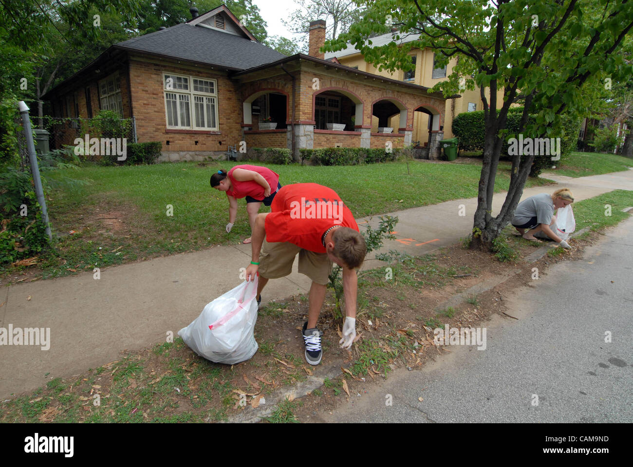 Volunteers from an innercity church pick up trash and used syringes