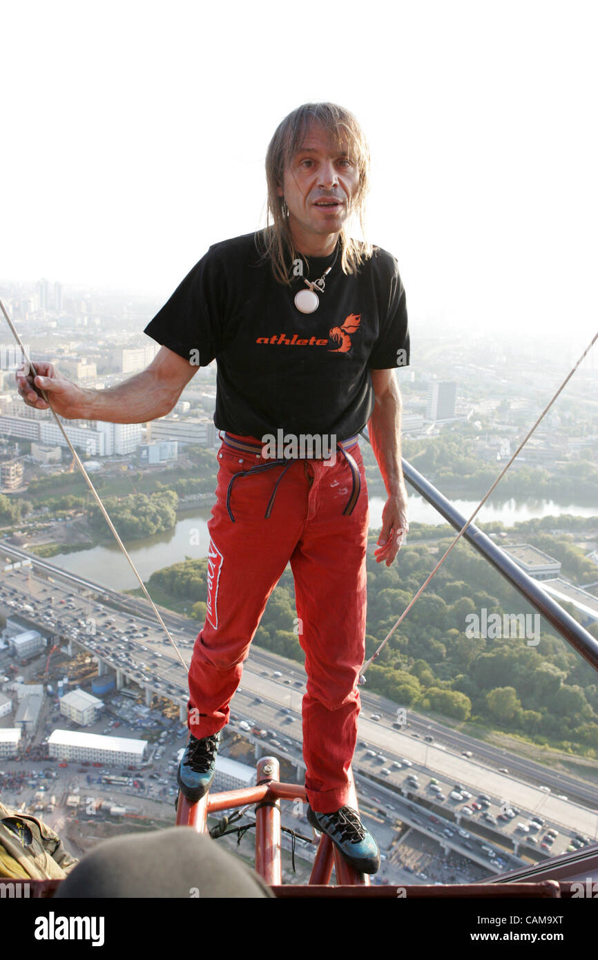 French urban climber Alain Robert scaled the 242-meter ...
