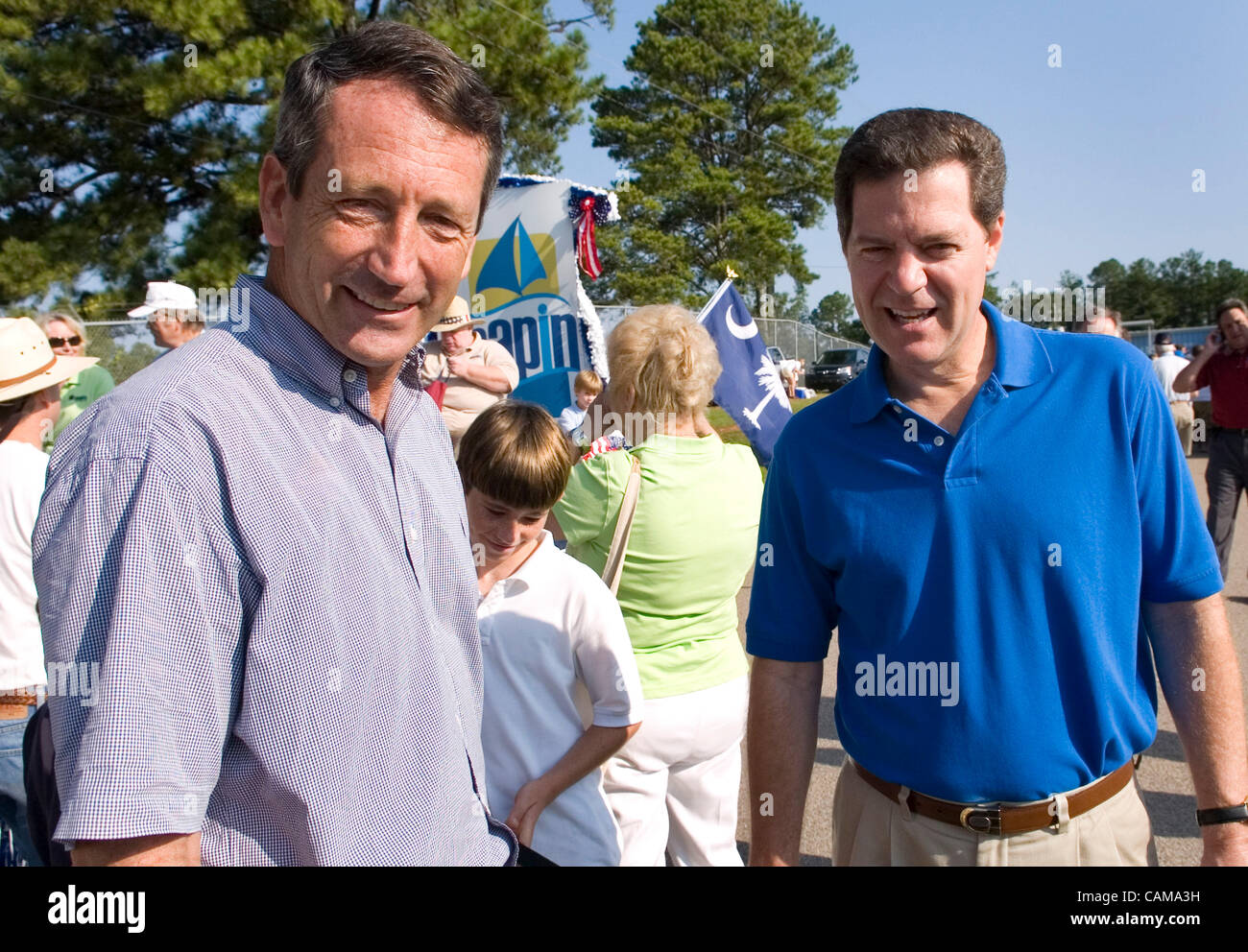 South Carolina Governor Mark Sanford, left, and his sons, speaks with former Republican presidential candidate Sam Brownback at a Labor Day Parade in Chapin, South Carolina on September 3, 2007. (Credit Image: © Erik Lesser/ZUMA Press) Stock Photo