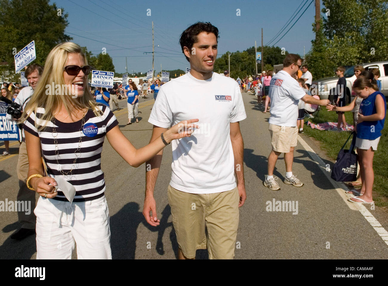 Craig Romney and his wife Mary campaign on behalf of his father