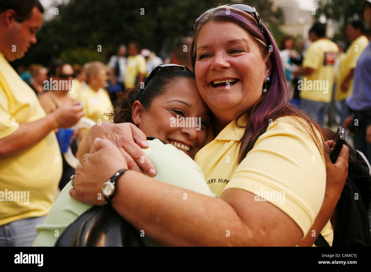 LEDE Yvonne Sanmiguel of Sacramento, left, hugs Danna Jensen of Merced ...