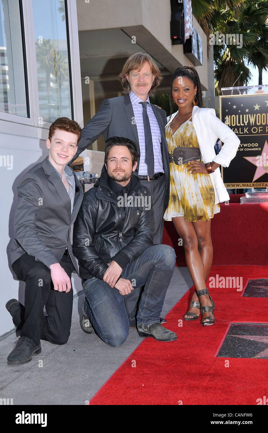 Cameron Monaghan, Justin Chatwin, William H. Macy, Shanola Hampton at the induction ceremony for Stars on the Hollywood Walk of Fame for William H. Macy and Felicty Huffman, Hollywood Boulevard, Los Angeles, CA March 7, 2012. Photo By: Michael Germana/Everett Collection Stock Photo