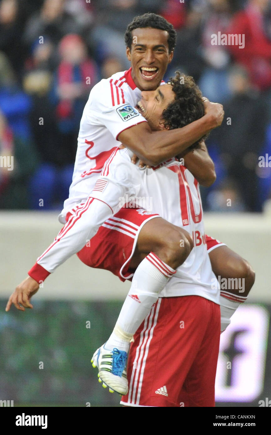 New York Red Bull midfielder MEHDI BALLOUCHY (10) and New York Red Bull defender ROY MILLER (7) celebrates at Red Bull Stadium in Harrison New Jersey New York defeats the Montreal Impact 5 to 2 Stock Photo