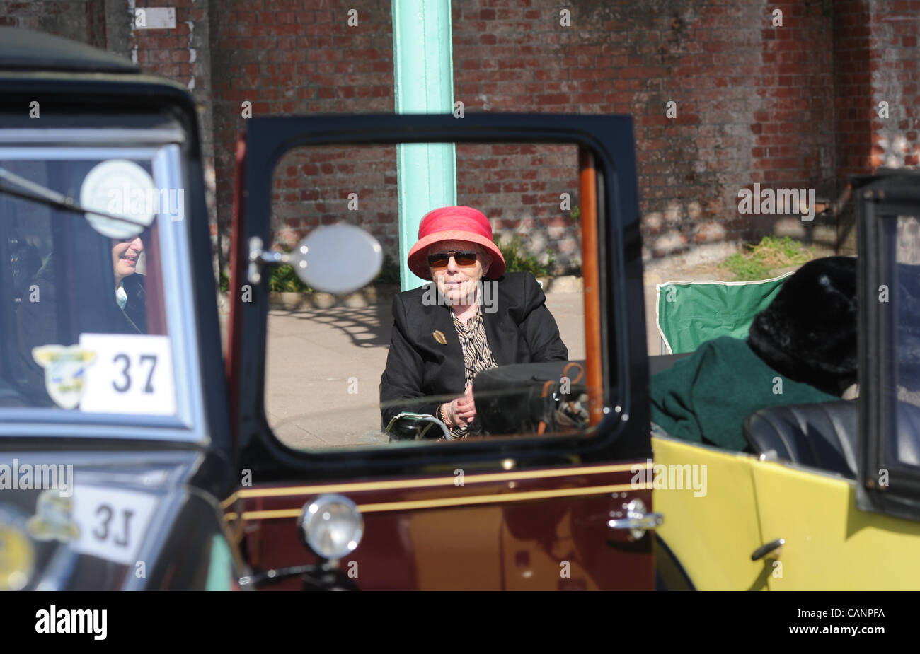 Brighton, UK. 1 April, 2012. Owners take part in the Austin 7 Car Run which finished on Brighton seafront today Stock Photo