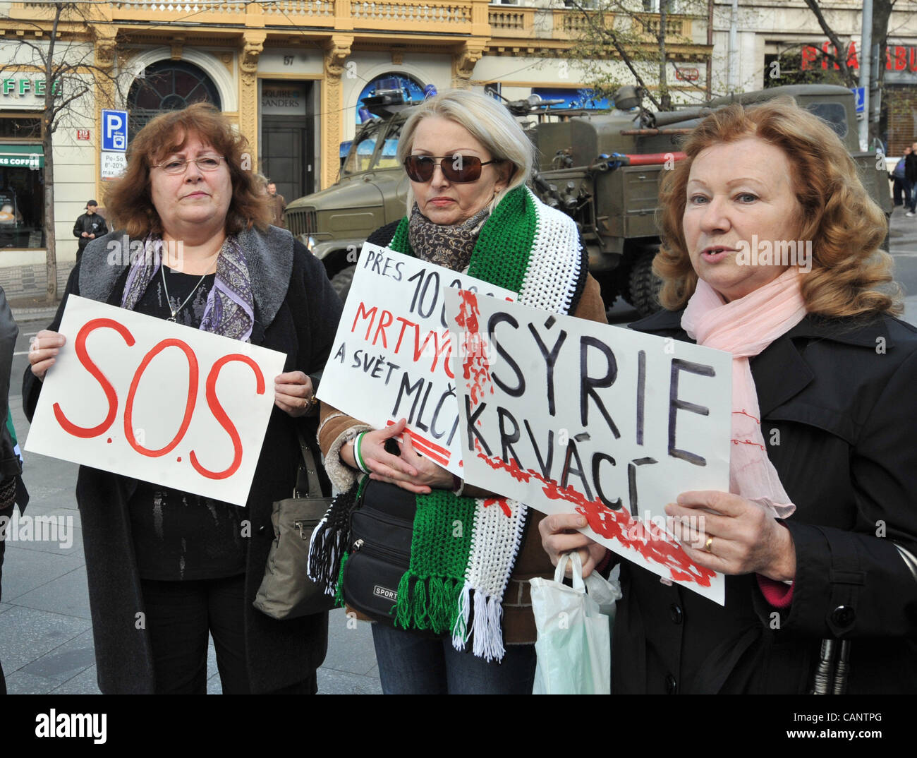 Anti-Syrian regime protesters call for Syrian President Bashar Assad to step down at Wenceslas Square in Prague, Czech Republic, Saturday, April 1st, 2012. (CTK Photo/Stan Peska) Stock Photo