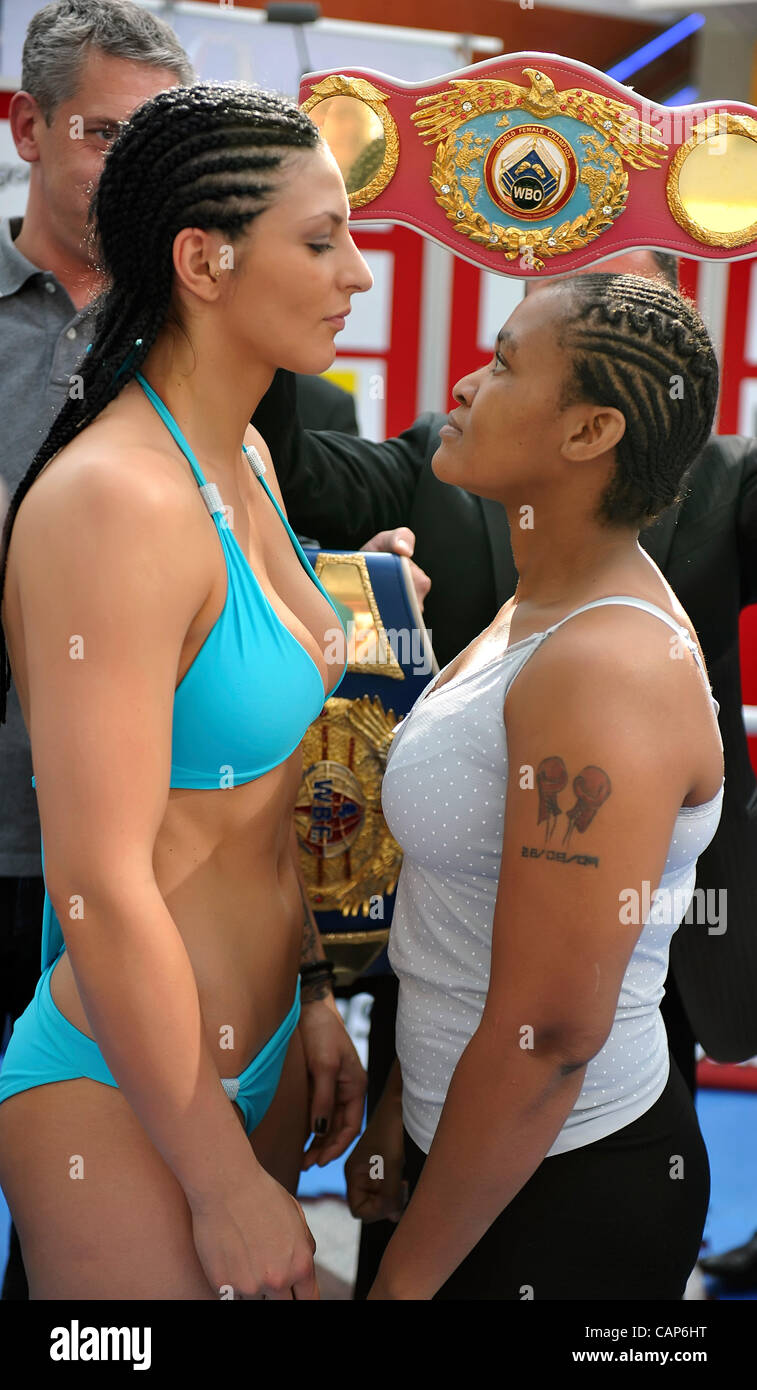 Boxers Christina Hammer (right) and Queen Tshabalal pose during the official Weight-In in Brno Modrice, Czech Republic on April 4, 2012. (CTK Photo/Igor Sefr) Stock Photo