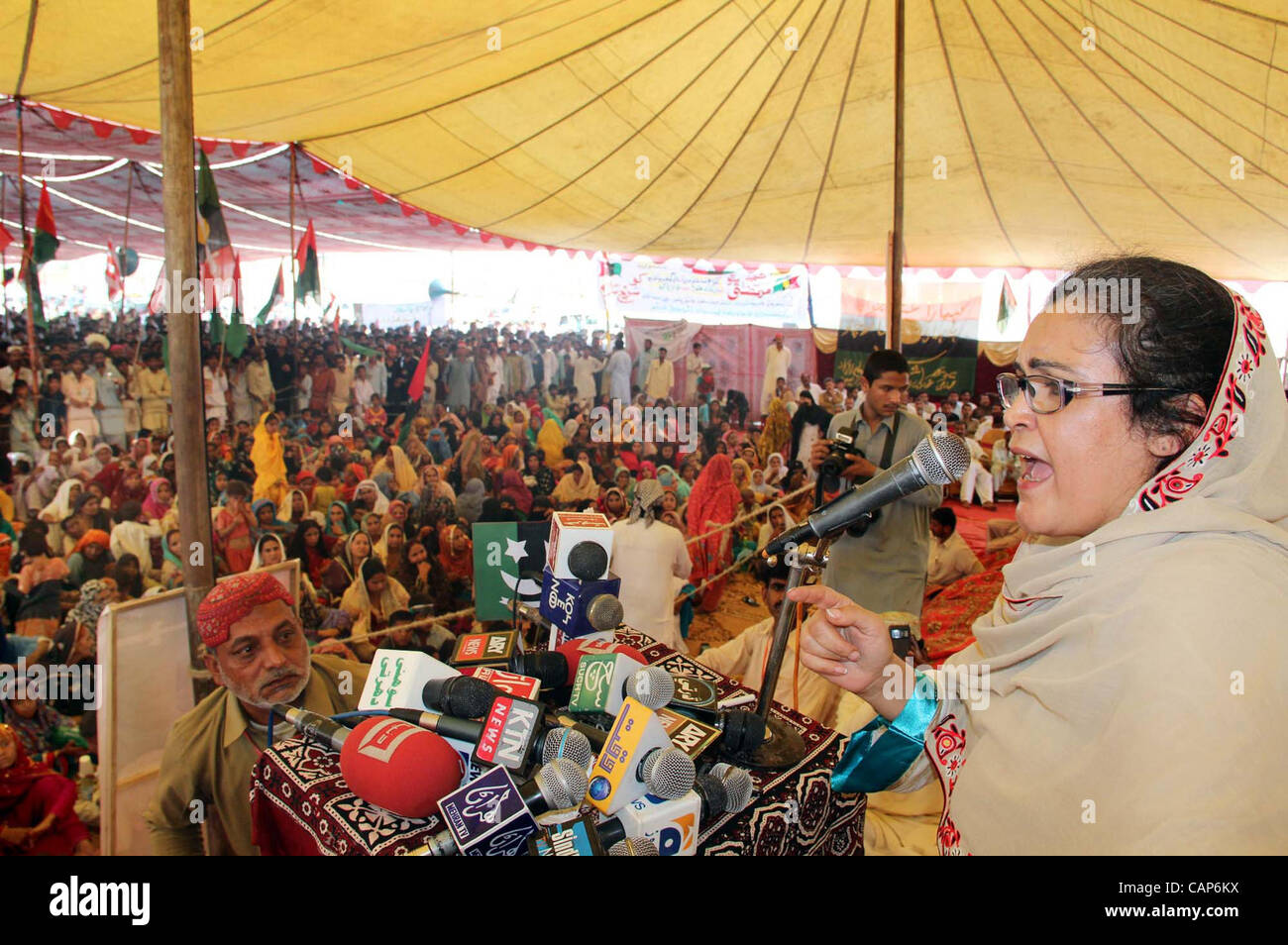 Peoples Party-SB Chairperson, Ghunwa Bhutto addresses to public gathering on the occasion of Death Anniversary of Peoples Party (PPP) Founder, Zulfiqar Ali Bhutto held in Garhi Khuda Bux on Wednesday, April 04, 2012 Stock Photo