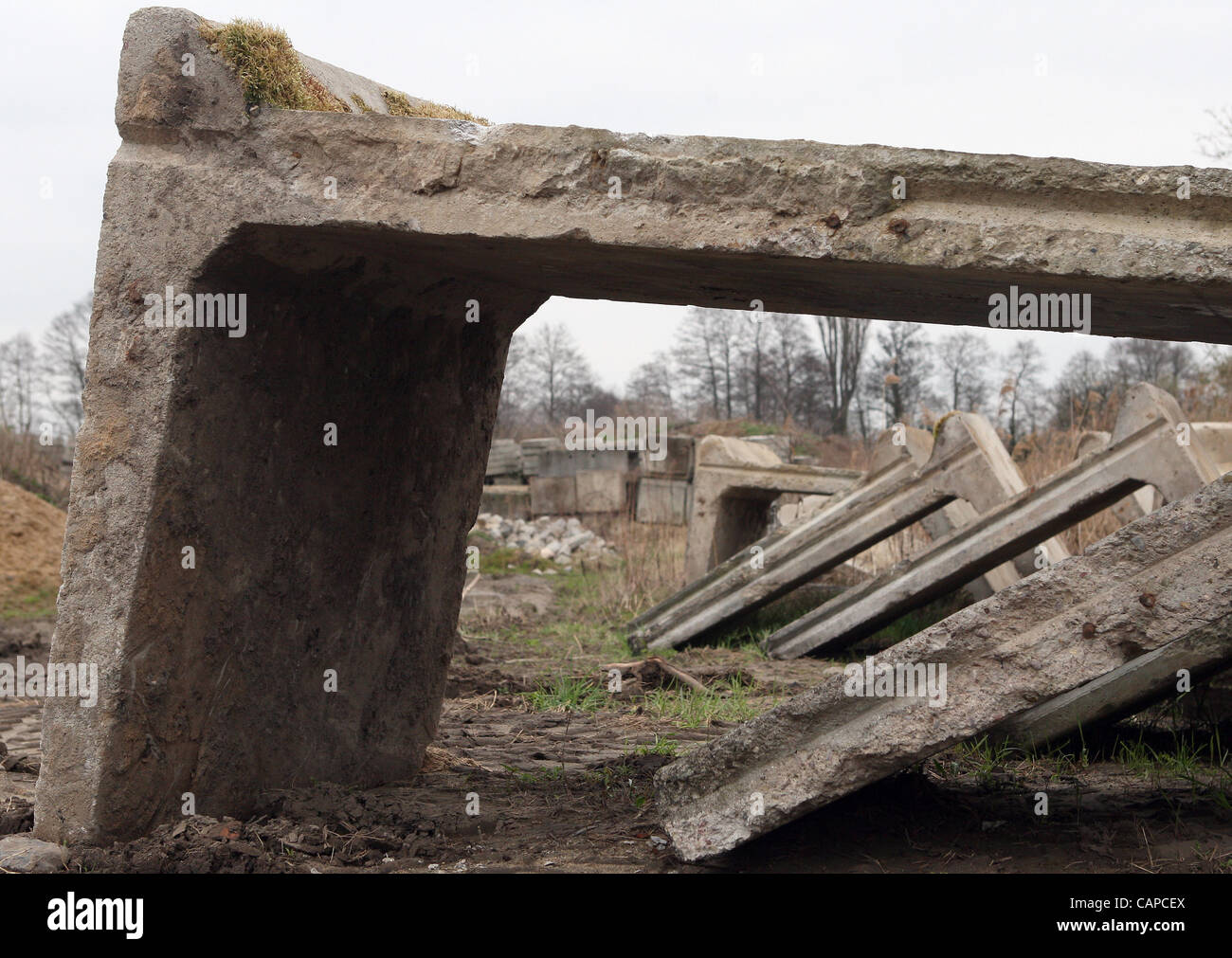 Original sections of the Berlin Wall stand outside of the city on
