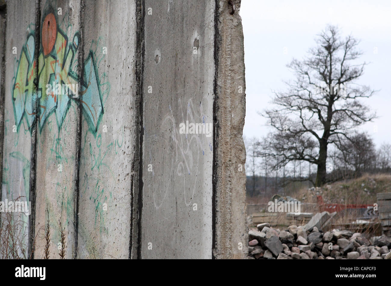 Original sections of the Berlin Wall stand outside of the city on