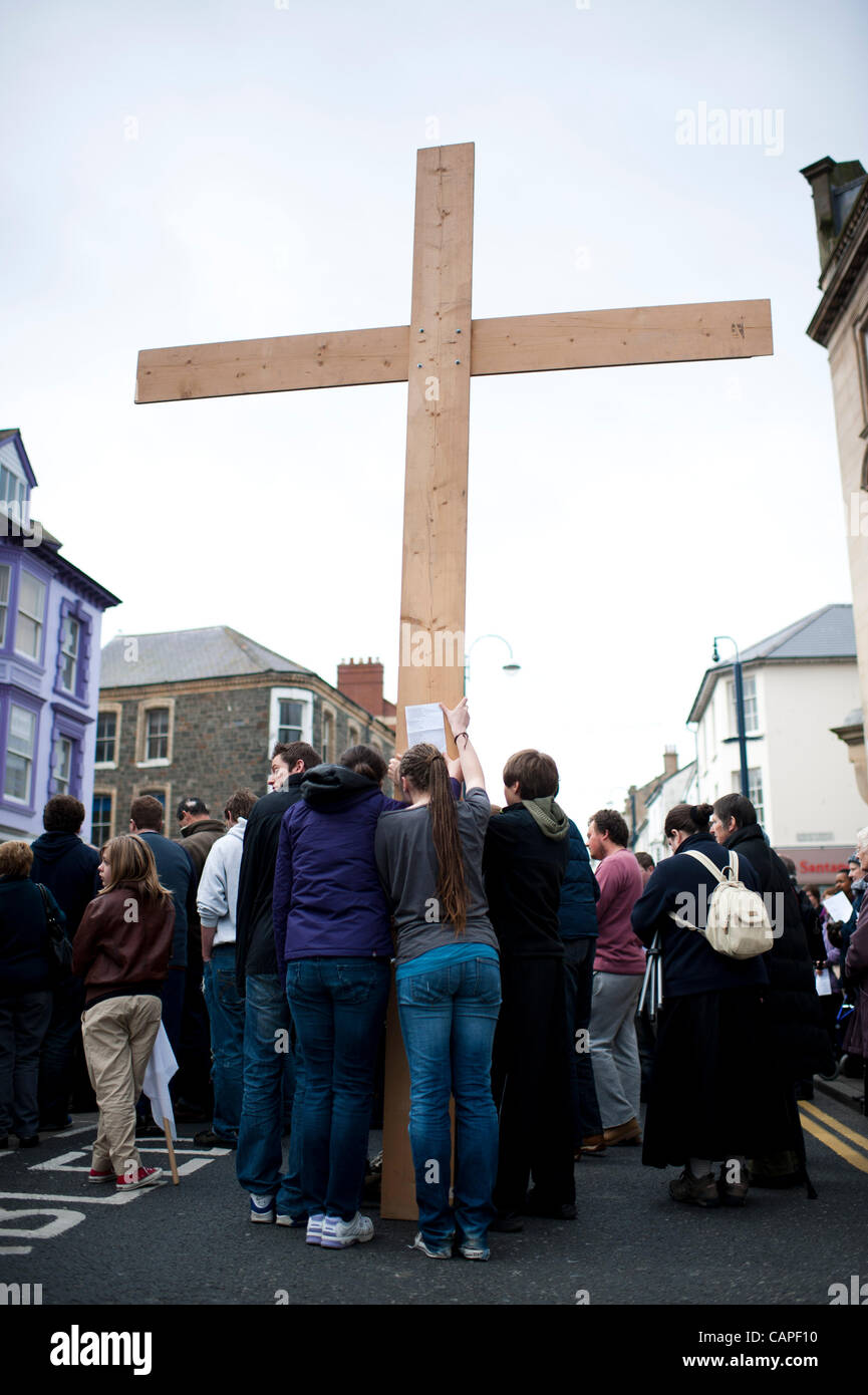 A group of Christians gather for a Good Friday open air prayer meeting and worship on the street in Aberystwyth, Wales, UK, on Friday 6th April 2012 Stock Photo