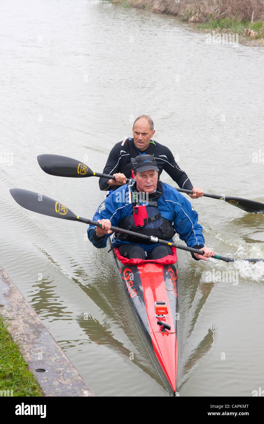 Devizes, UK. 07 April 2012. Sir Steve Redgrave (rear) and Roger Hatfield come into first portage at Crofton locks on the Kennet and Avon Canal. They started the 125 mile race in Devizes at 09.45 on Easter Saturday and expect to take approx. 22 hours before finishing at Westminster on Easter Sunday. Stock Photo