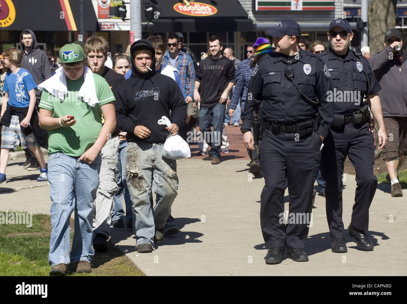 April 7, 2012 - Ann Arbor, Michigan, U.S - Cops patrol the University of Michigan campus during the 41st annual Hash Bash in Ann Arbor, MI on April 7, 2012. (Credit Image: © Mark Bialek/ZUMAPRESS.com) Stock Photo