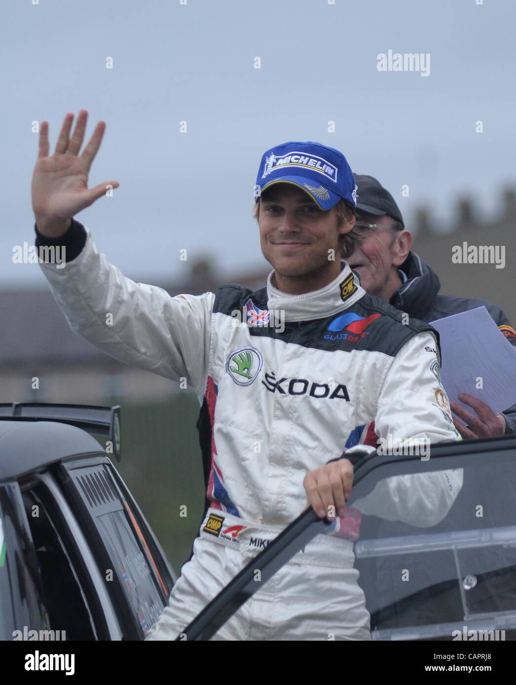 Reigning Intercontinental rally champion Andreas Mikkelsen waves as he finishes second in the Circuit of Ireland International Rally in Armagh, Northern Ireland 7 April 2012. The Circuit of Ireland Rally is the third round of Intercontinental Rally Challenge 2012. Stock Photo